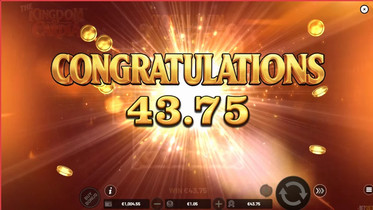 The Kingdom of Cardia slot game interface showing fantasy garden theme and card symbols